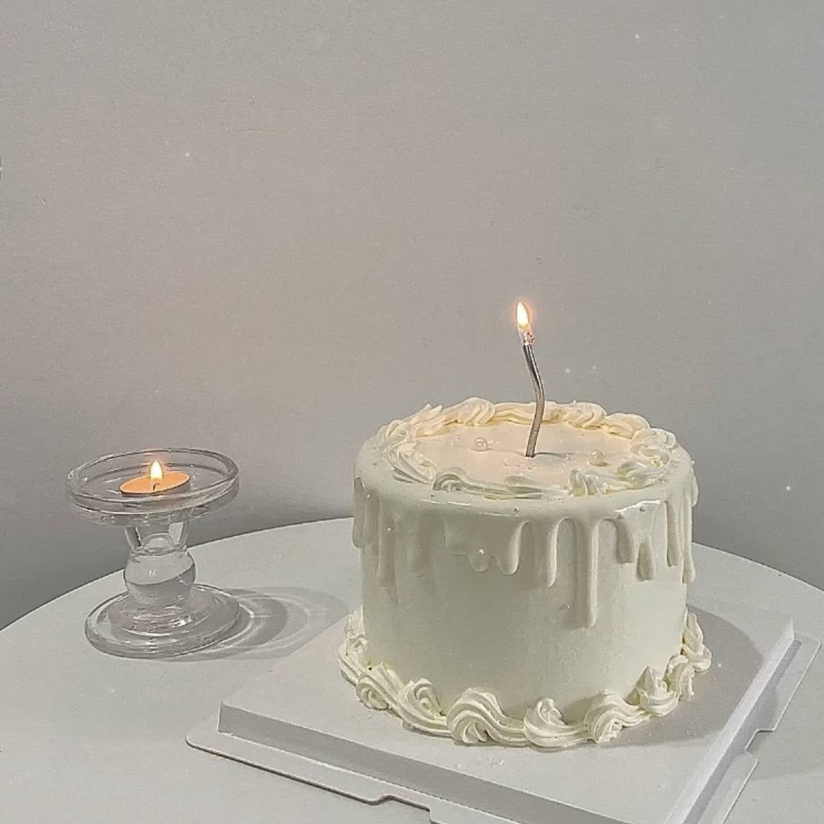 Simple Minimalist White Drips Cake