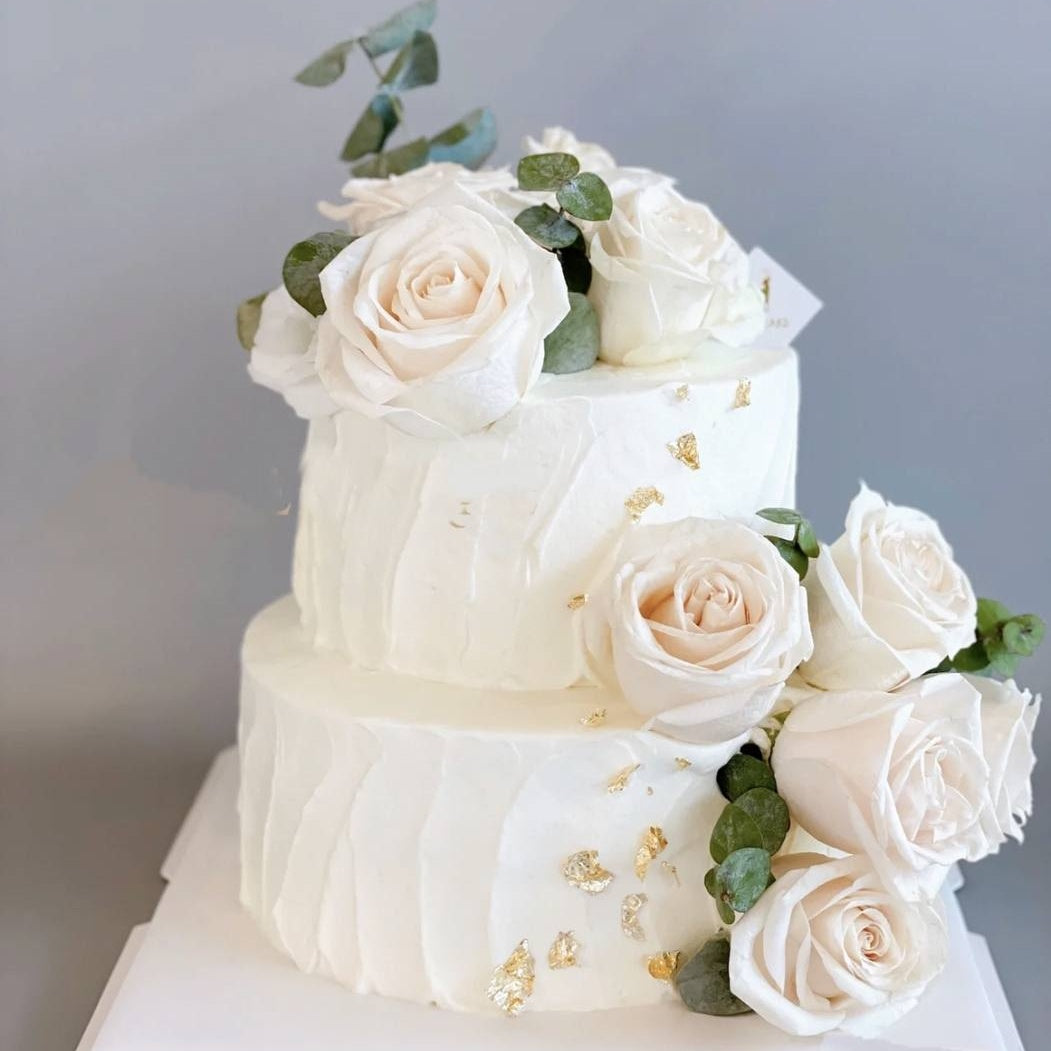 Slanted White Stroke Floral Wedding Cake