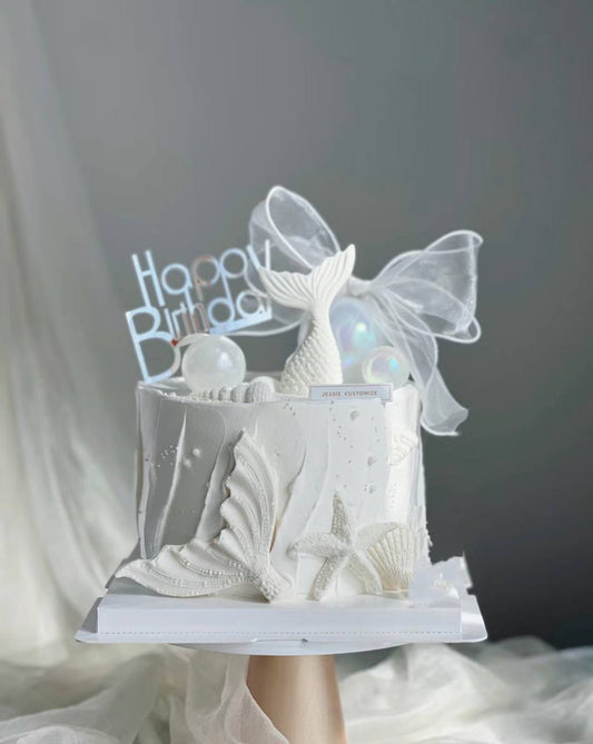 white mermaid ribbon cake